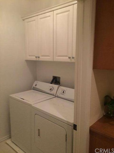 Separate Laundry Room to include full size Washer 