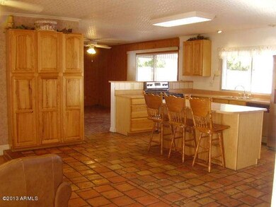 KITCHEN ISLAND, PANTRY, FAMILY ROOM