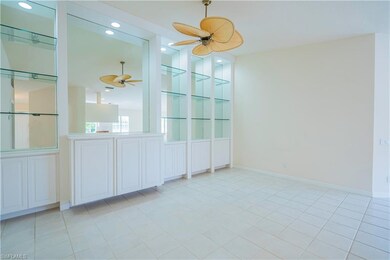 Great Room has built-in Wall Unit with room for Fl