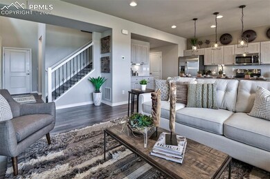 Open concept main level. Photos are from a model a