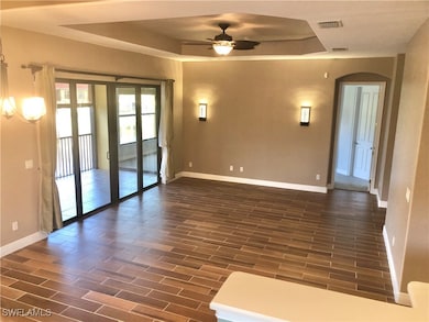 Livingroom is renovated with new wood grain tile.