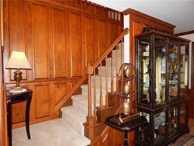 Entry/Foyer. Raised panel wainscot was added to th