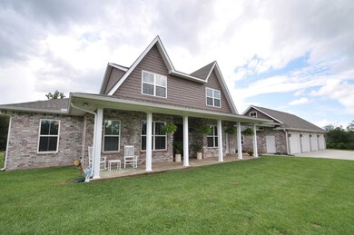 Front of Home and 4 Car Garage