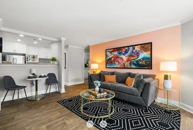 Living room featuring dark hardwood / wood-style f