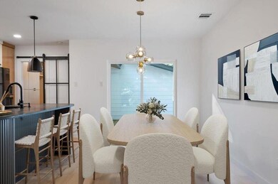 Dining space featuring a chandelier