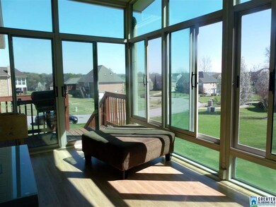 The screened-in porch is a great place for outdoor