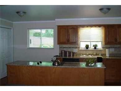 Kitchen. CENTER ISLAND WITH BUILT IN COOKTOP AND G