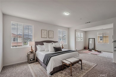 Primary bedroom with spacious alcove