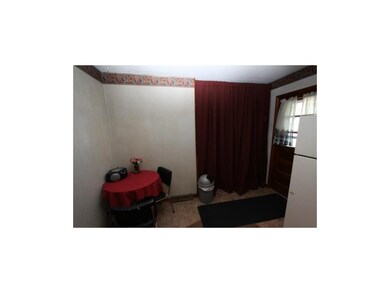 Eat in Kitchen.  Laundry closet behind closed curt