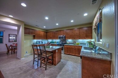 Photo of model home kitchen, photo not intended to
