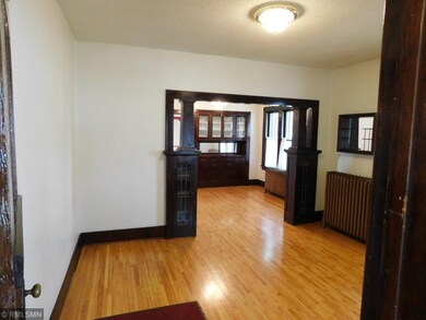 Gleaming hardwood floors and gorgeous original woo