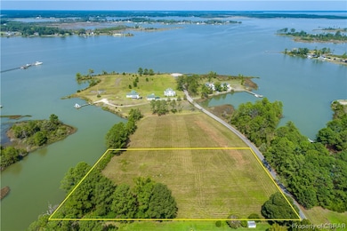 Located on a stunning point of land