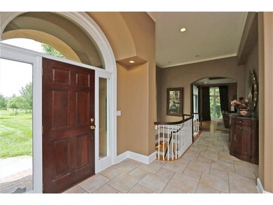 GRAND ENTRY FOYER TO PRIMARY RESIDENCE