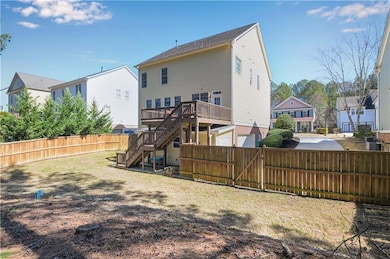 Back of house with stairs, cooling unit, a deck, f