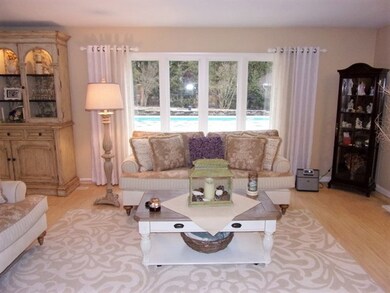 Living Room w/ View to Back Yard Inground Pool
