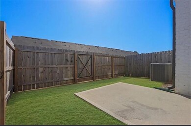View of yard featuring a fenced backyard, a patio 