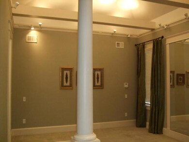 Master bedroom has track lighting creating a glow 