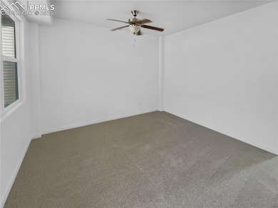 7030 Dutch Loop, Colorado Springs, CO 80925 - photo 3