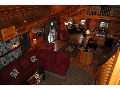 Other. View from the loft area. The chimney pipe i