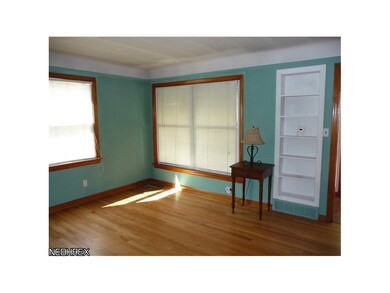 The living room is bright and cheery with newer wi