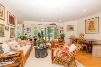 Living and dining area with French...