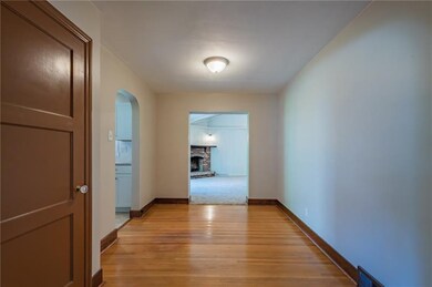 This is the dining room space. The door you see leads to the second level.