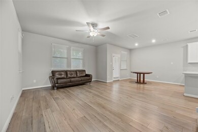 Abundant natural light pours in, beautifully accen