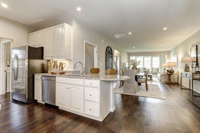 View into the dining area into great room and optional sunroom
