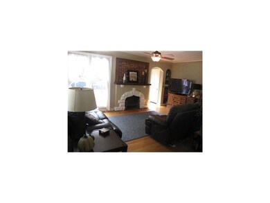 Living Room. The ceiling-to-floor windows in the l