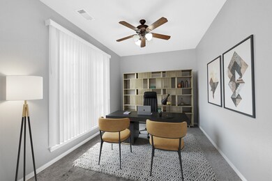 This home office has lots of natural lighting comi