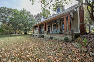 View of front of home featuring covered porch