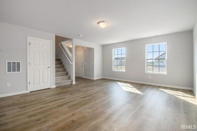 The large great room has an abundance of natural l