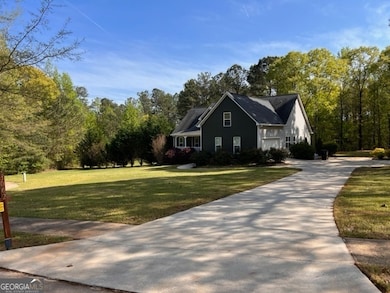 Side view right with long driveway
