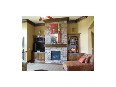 Fireplace in great room with built-in.