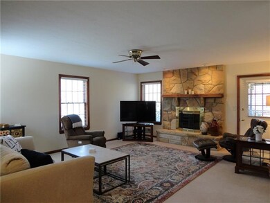 Living room features a gorgeous floor to ceiling w