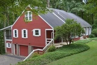 The home has a large first floor master suite w/of