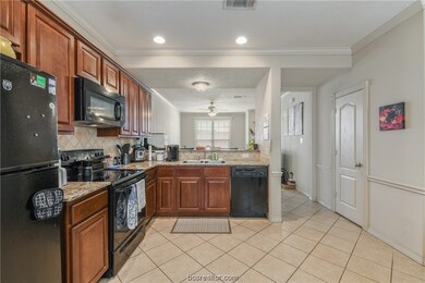 Kitchen area with granite countertops