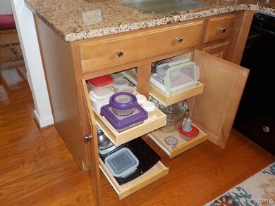 Kitchen cabinets have pull out shelves