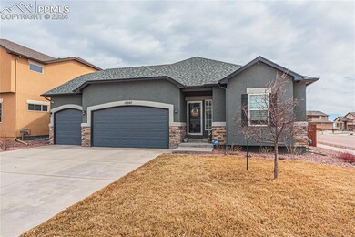 View of front of house featuring a garage and a fr