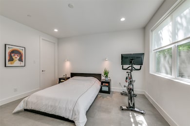 Bedroom featuring baseboards and recessed lighting