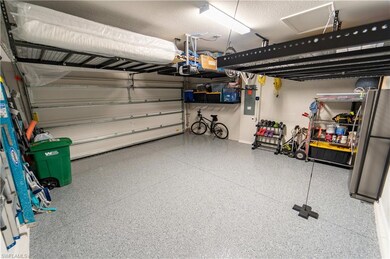 Garage with a garage door opener, electric panel, 