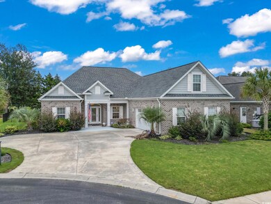 Craftsman-style home with a front lawn