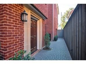 View of home's exterior featuring brick siding