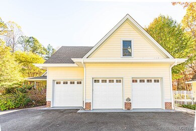 A True 3-Car Garage with a paved driveway!