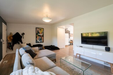 Living area featuring wood finished floors