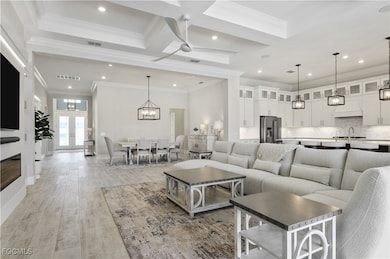 Living room featuring recessed lighting, light woo