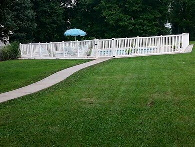 Exterior Back. inground pool