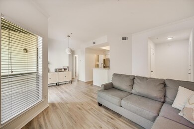 Living room with light wood-style flooring and or
