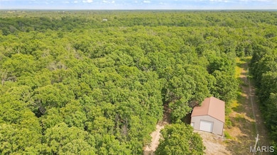 Drone / aerial view of a heavily wooded area