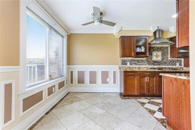 Breakfast area, adjacent to kitchen. Marble floor